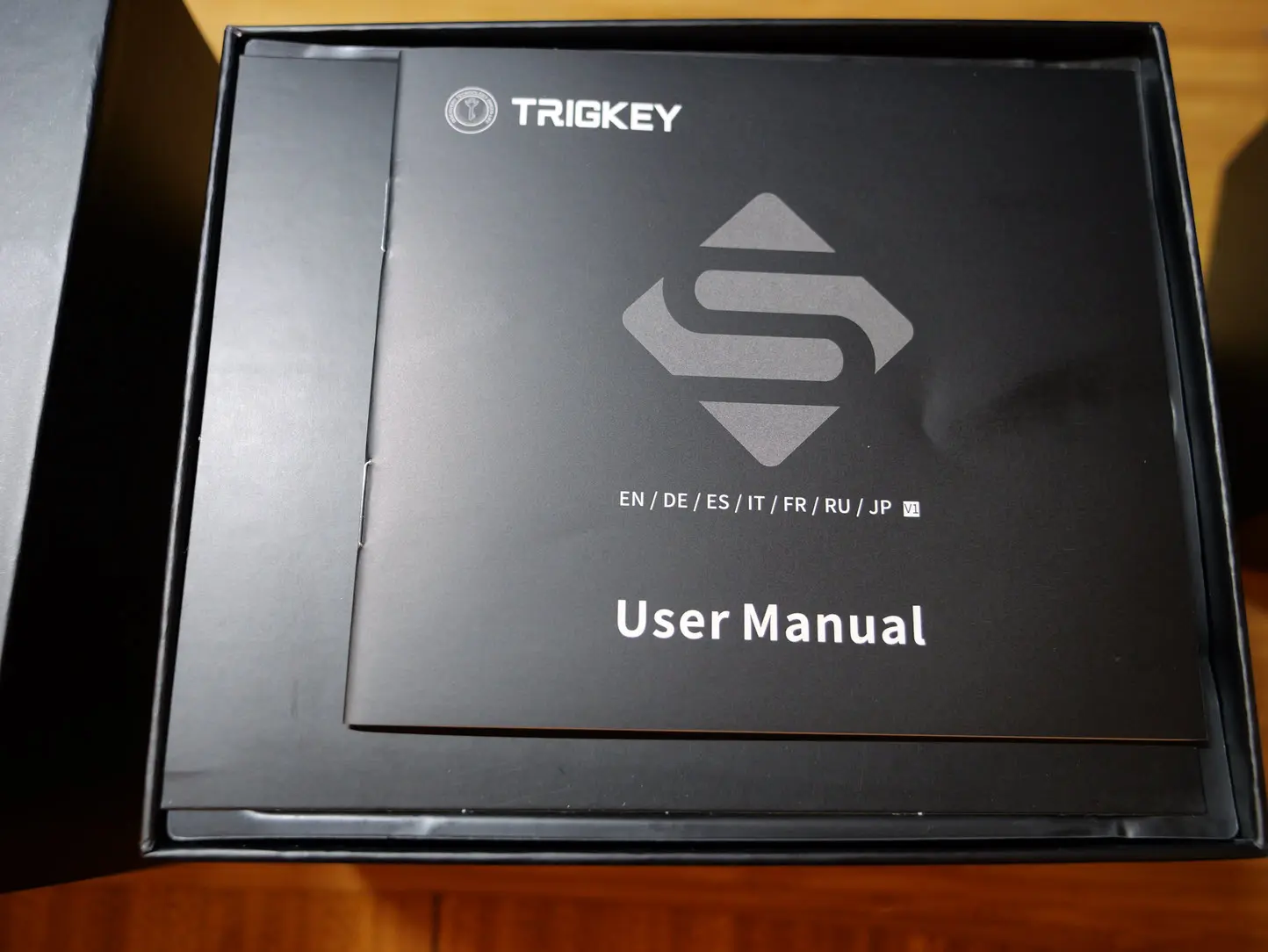 After taking the top cover off user manual and other things in the trigkey s7 box