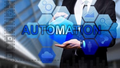 Glowing,Text,"automation",In,The,Hands,Of,A,Businessman.,Business