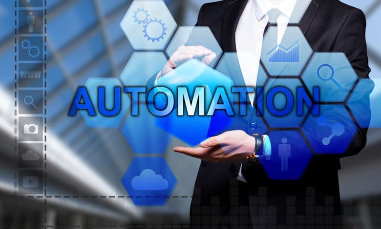 Glowing,Text,"automation",In,The,Hands,Of,A,Businessman.,Business
